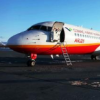 互联网资讯：ARJ21700客机身披国旗降落在北京首都国际机场